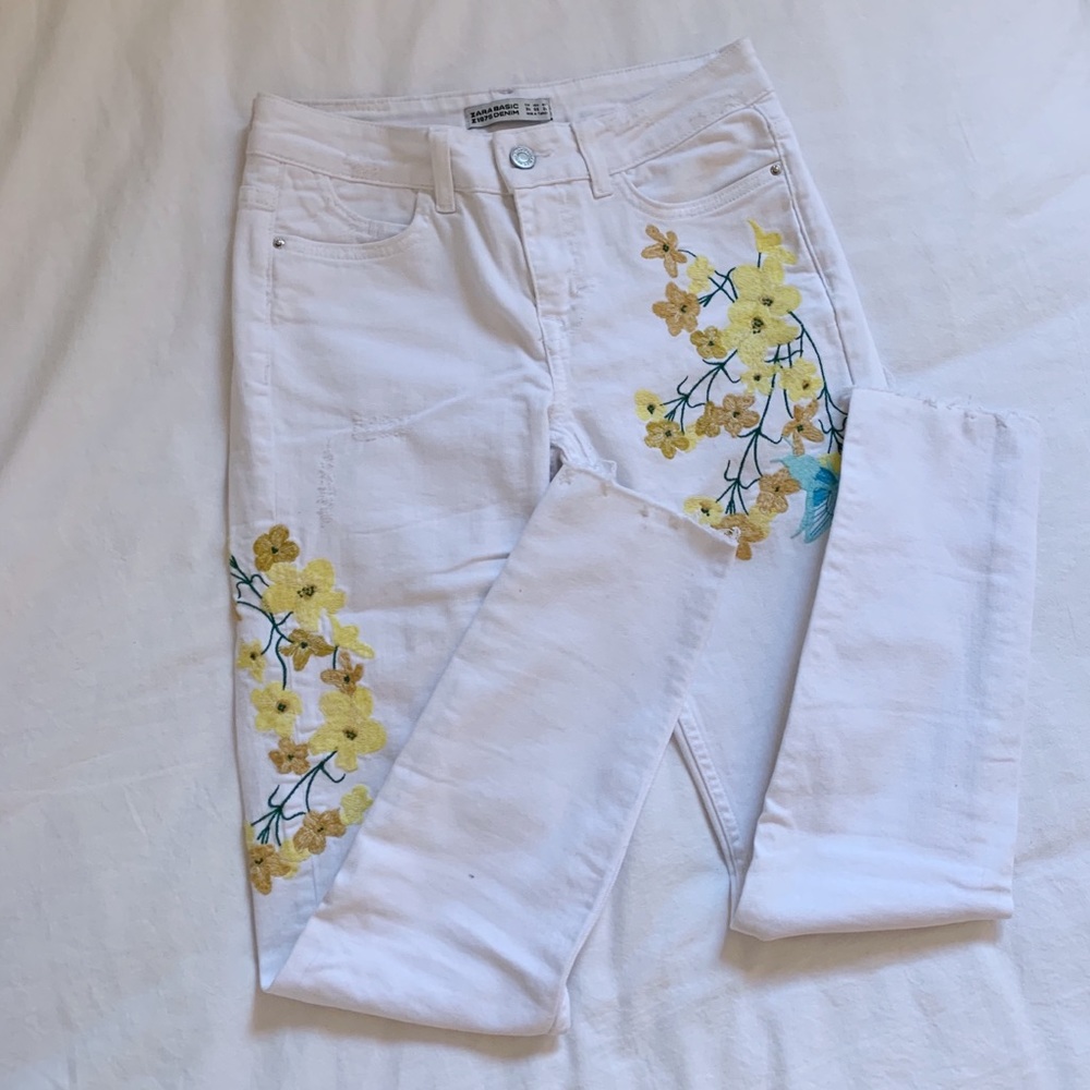 Zara white embroidered skinny jeans.